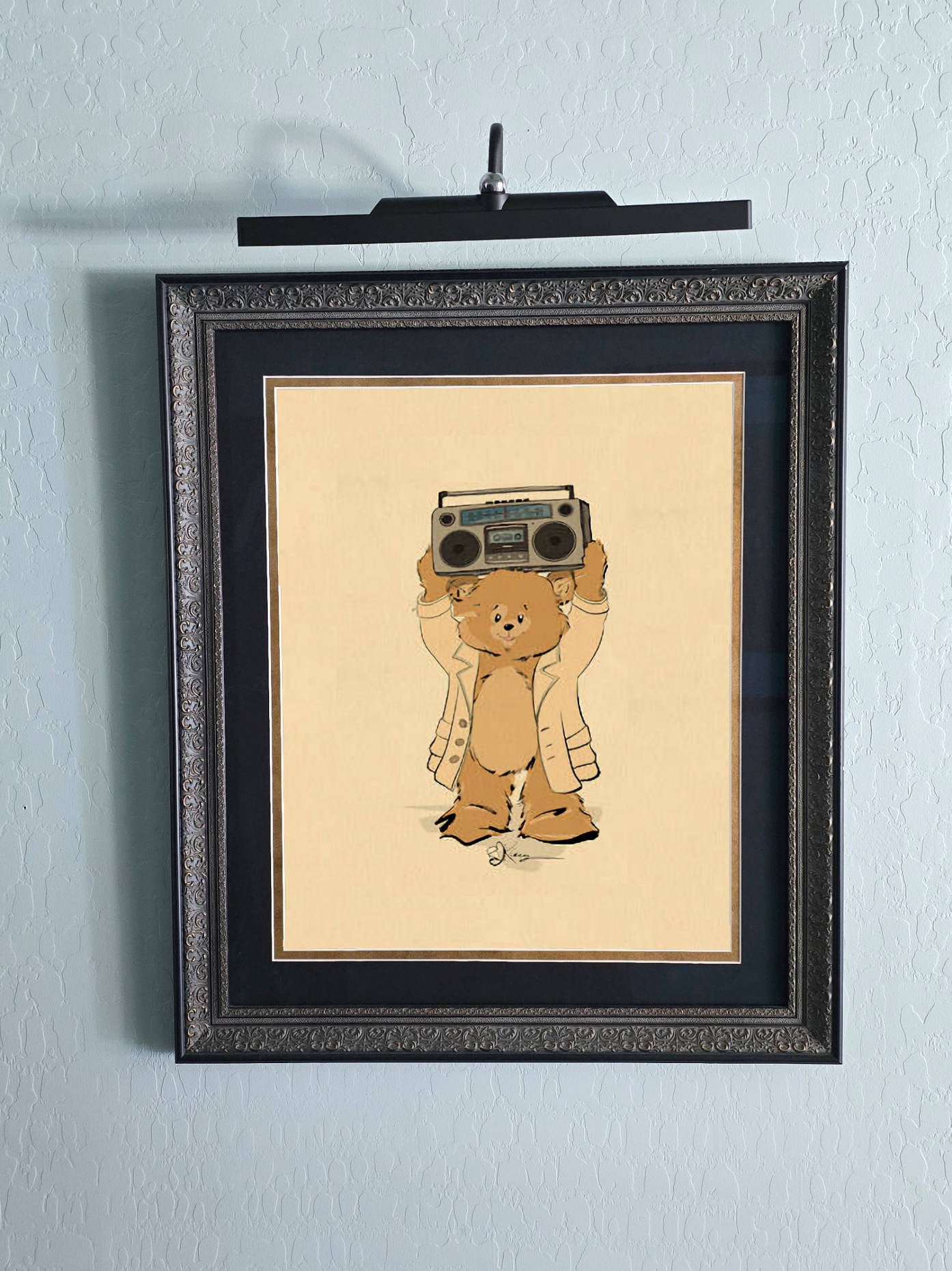 Framed vintage-style wall art featuring Lloyd the Pola Bear in a trench coat holding a boombox over his head. The retro 80s-inspired illustration is displayed in an ornate dark frame with a picture light above it, hanging against a textured light blue wall.