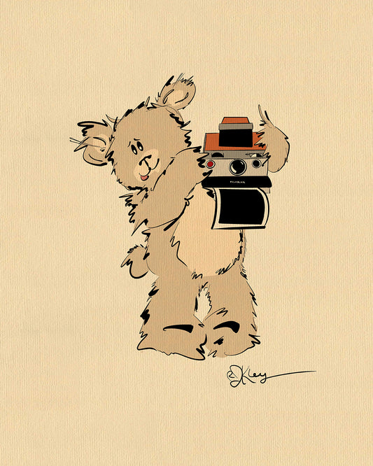 A whimsical sketch of a cute brown bear character named Greg, happily holding up a vintage Polaroid instant camera against a cream-colored background.

