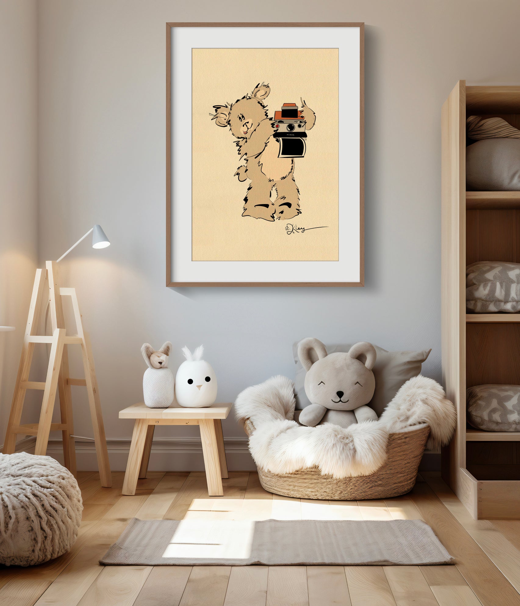 A Pola Bear "Greg" print, displayed in a large wood frame, hangs in a warm and modern nursery. The print is styled above a cozy basket chair and minimalist wooden toys, creating a stylish and inviting space.